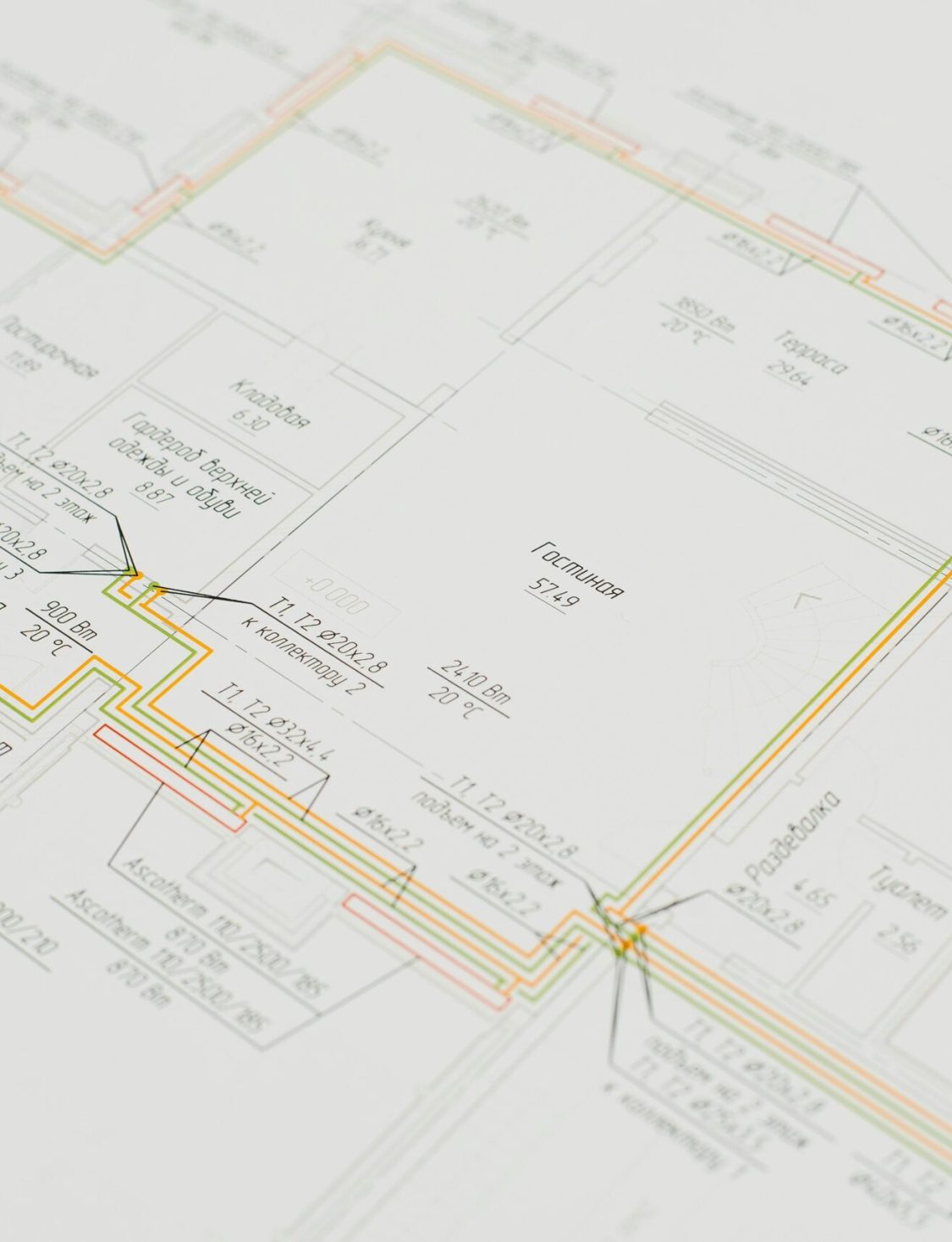 Close-up of a detailed architectural blueprint showing design plans on a desk. Ideal for construction and design concepts.